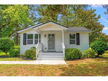 Charming single-story home with a well-manicured lawn and inviting entrance at 1004 Georgetown St., Marion, SC 29571