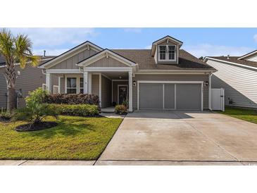 Charming single-story home with well-manicured lawn and attached two-car garage, in a desirable neighborhood at 1741 Parish Way, Myrtle Beach, SC 29577