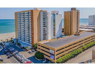 Oceanfront Sands Ocean Club exterior showcasing the high-rise building and parking garage at 9550 Shore Dr. # 1418, Myrtle Beach, SC 29572