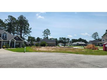 View of a residential lot under construction with foundation in a wooded area at 800 Stone Pine Ct., Loris, SC 29569