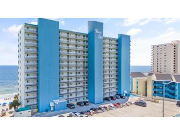 The Water's Edge resort building offers beachfront condo living with private balconies and plentiful parking for owners and guests at 1012 N Waccamaw Dr. # 1107, Murrells Inlet, SC 29576
