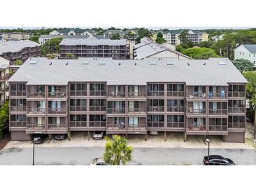 Three-story condo with private balconies, offering stunning views and convenient parking at 207 N Ocean Blvd. # 342, North Myrtle Beach, SC 29582