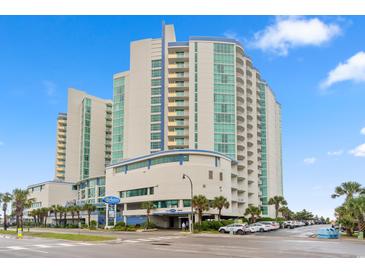 Stunning full exterior view of the Avista Resort in North Myrtle Beach on a bright sunny day with a blue sky at 300 N Ocean Blvd. # 122, North Myrtle Beach, SC 29582