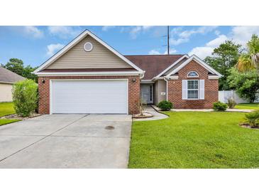 Charming single-Gathering home featuring a brick facade, attached garage, and well-manicured lawn at 405 Vintage Circle, Myrtle Beach, SC 29579