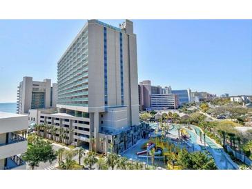 Exterior of the Sand Dunes Resort building showing the outdoor waterpark and ocean views at 201 74Th Ave. N # 707, Myrtle Beach, SC 29572