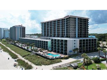 Spacious condominium complex with multiple pools, lush greenery, and beach access, perfect for a relaxing getaway at 2311 S Ocean Blvd. # 437, Myrtle Beach, SC 29577