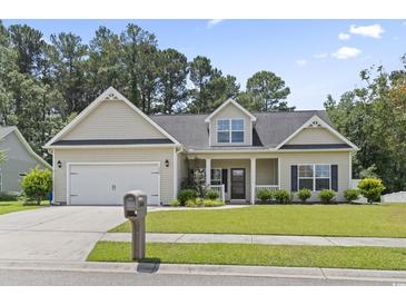 Inviting single-Gathering home with a two-car garage and manicured lawn at 1448 Tiger Grand Dr., Conway, SC 29526