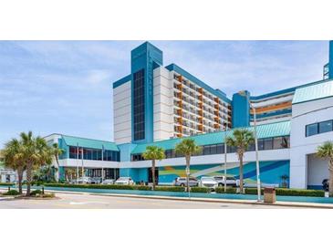 Beautiful hotel exterior showcasing its architecture, parking area, and landscaping at 1501 S Ocean Blvd. # 805, Myrtle Beach, SC 29577
