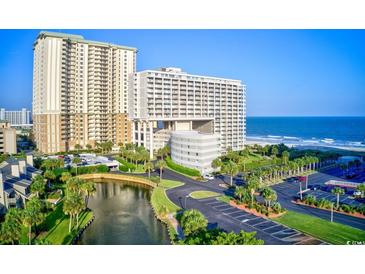 Stunning beachfront condos with lush landscaping, parking and waterway access at 9994 Beach Club Dr. # 1202, Myrtle Beach, SC 29572