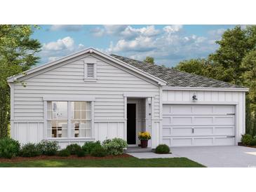 Charming one-story home with white siding, a two-car garage, and manicured landscaping at Lot 148 Tibetan St., Conway, SC 29526
