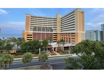 Beautiful resort featuring multiple stories, parking, and beautiful landscapes near the beach at 6900 N Ocean Blvd. # 201, Myrtle Beach, SC 29572
