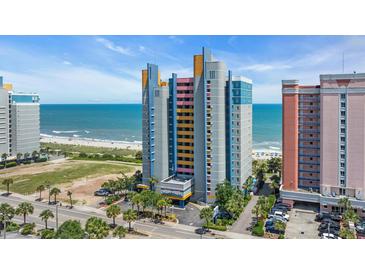 Bright, colorful condo building at the beach with ocean views and palm trees at 1700 N Ocean Blvd. # 651, Myrtle Beach, SC 29577