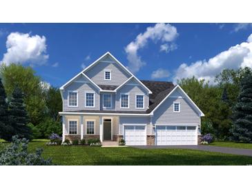Charming two-story home featuring a two-car garage, stone accents, and a beautifully landscaped yard at 775 Indigo Bay Circle, Myrtle Beach, SC 29579