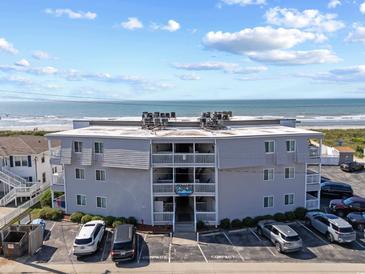 Three story condo building with ocean view, ample parking and beach access for easy enjoyment at 5000 N Ocean Blvd. # E-2, North Myrtle Beach, SC 29582