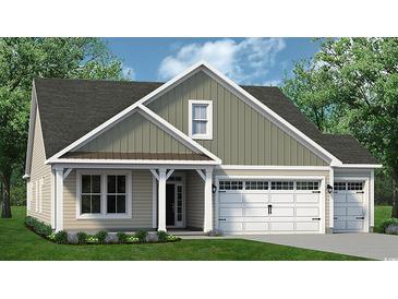 Charming single-Gathering home featuring a covered porch, a two-car garage, and professionally landscaped front yard at 1243 Halter Pl., Calabash, NC 28467
