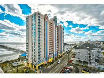 Beautiful high-rise resort with balconies overlooks a stunning ocean view and nearby pier at 3500 N Ocean Blvd. # 701 702, North Myrtle Beach, SC 29582