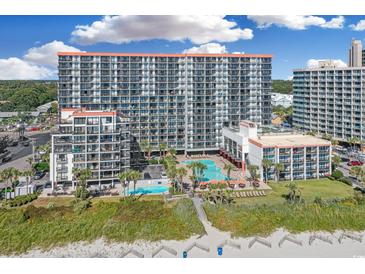 Stunning aerial view of a beachfront resort featuring multiple pools and well-manicured grounds at 7200 N Ocean Blvd. # 459, Myrtle Beach, SC 29572