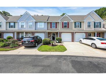 Charming townhomes with well-manicured lawns and individual driveways at 158 Palisade Loop # 158, Pawleys Island, SC 29585