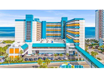 Bright, airy hotel exterior near the beach with an attached covered parking area and walkway at 1501 S Ocean Blvd. # 639, Myrtle Beach, SC 29577