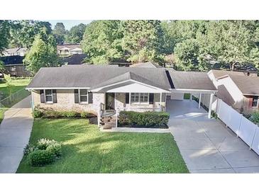 Charming single-story brick home with a well-maintained lawn and an inviting front porch at 616 Mckinley Way, Conway, SC 29526