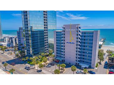 A multi-story resort complex with ocean views and convenient street access and palm trees at 1304 N Ocean Blvd. # S-501, Myrtle Beach, SC 29577