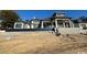 Rear exterior of a luxury home with covered patio at 4302 Gray Heron Dr., North Myrtle Beach, SC 29582