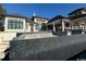 View of luxury outdoor pool and backyard with modern design, stone, and tile at 4302 Gray Heron Dr., North Myrtle Beach, SC 29582