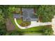 Aerial view showcasing the property's well-manicured grounds, circular drive, and lush landscaping at 1262 Limestone St., Murrells Inlet, SC 29576