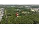 Aerial view showing location of wooded property, set amidst a lush green landscape at 1262 Limestone St., Murrells Inlet, SC 29576