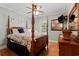 Bedroom with a four poster bed, ceiling fan and light blue walls at 1262 Limestone St., Murrells Inlet, SC 29576