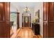 Elegant entryway featuring a chandelier, decorative wood flooring, and a stained glass front door at 1262 Limestone St., Murrells Inlet, SC 29576