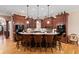 Stylish kitchen featuring an expansive island with bar seating, custom cabinetry, and modern appliances at 1262 Limestone St., Murrells Inlet, SC 29576