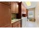 Laundry room with granite counters, cabinets and shelves for extra storage at 1262 Limestone St., Murrells Inlet, SC 29576