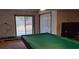 Finished basement with pool table, exercise equipment, and backyard access at 7101 Choppee Rd., Georgetown, SC 29440