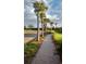 Attractive brick walkway lined with palm trees at 7101 Choppee Rd., Georgetown, SC 29440