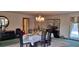 Elegant dining room with chandelier and seating for six at 7101 Choppee Rd., Georgetown, SC 29440