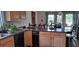 Kitchen boasts granite countertops and ample cabinetry at 7101 Choppee Rd., Georgetown, SC 29440