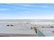 Lovely balcony view of the ocean, beach, and rooftop with white clouds at 2301 S Ocean Blvd. # 621, Myrtle Beach, SC 29577