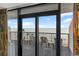 Balcony view of the ocean with seating, sliding glass doors, and exterior carpet at 2301 S Ocean Blvd. # 621, Myrtle Beach, SC 29577