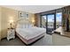 Relaxing bedroom featuring a king-sized bed and private balcony access with beautiful ocean views at 2301 S Ocean Blvd. # 621, Myrtle Beach, SC 29577