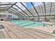 Spacious indoor pool with a translucent roof and comfortable seating at 2301 S Ocean Blvd. # 621, Myrtle Beach, SC 29577