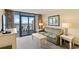 Cozy living room with a comfortable seating area and access to the balcony offering stunning ocean views at 2301 S Ocean Blvd. # 621, Myrtle Beach, SC 29577