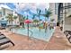 Water park with fun features including a mushroom fountain, colorful play structures and palm trees at 2301 S Ocean Blvd. # 621, Myrtle Beach, SC 29577