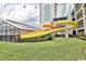 A thrilling outdoor water slide with adjacent indoor pool on a sunny day at 2301 S Ocean Blvd. # 621, Myrtle Beach, SC 29577
