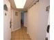 Hallway leading to unit features tiled flooring, access to the main room, and bathroom at 1501 S Ocean Blvd. # 1048, Myrtle Beach, SC 29577
