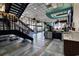 Bright lobby featuring tile floors, multiple ceiling fans, coffee bar and staircase to the upper level at 1501 S Ocean Blvd. # 1048, Myrtle Beach, SC 29577