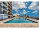 Refreshing outdoor pool with plenty of lounge chairs and clear blue water at 1501 S Ocean Blvd. # 1048, Myrtle Beach, SC 29577