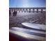 Relaxing beach scene with surfboards and pier in background at 9 Gumwood Dr., Carolina Shores, NC 28467