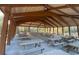 Spacious community pavilion with numerous picnic tables at 9 Gumwood Dr., Carolina Shores, NC 28467