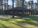 Community picnic pavilion with tables at 9 Gumwood Dr., Carolina Shores, NC 28467